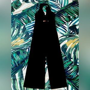 Black Bebe jumpsuit with a halter backing.